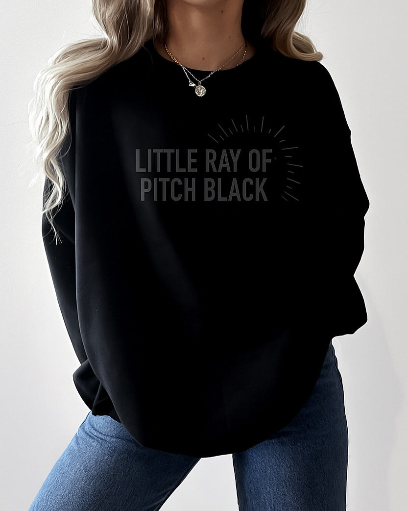 little ray of pitch black sweater