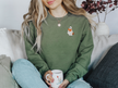 Embroidered Ghost Reading Book Classic Sweater