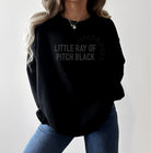 little ray of pitch black sweater